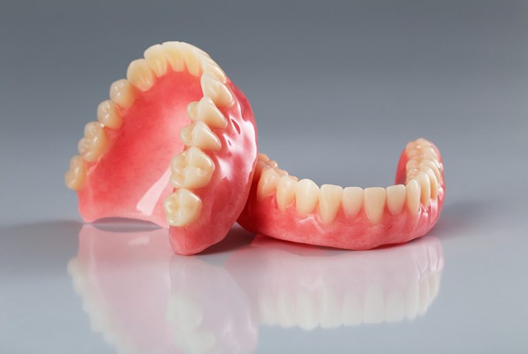 How Much Do Dentures Cost Without Insurance?
